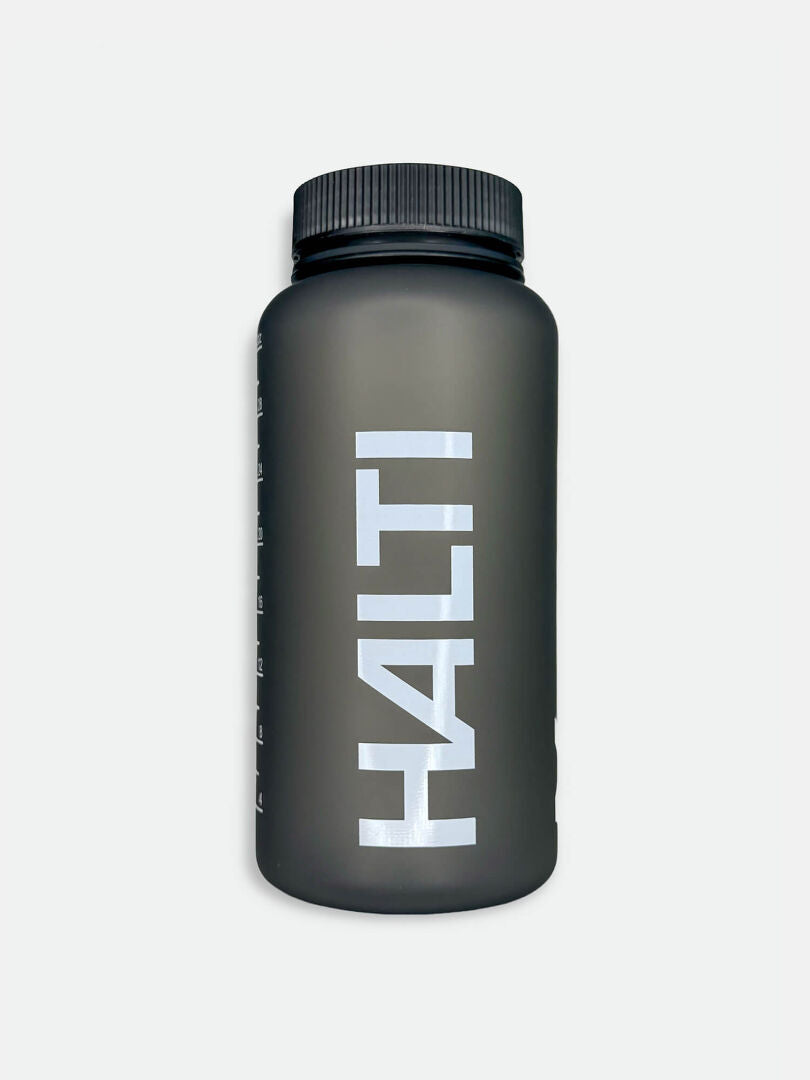 The Halti Drinking Bottle 1000 ML is dark gray PETG plastic with a black lid and bold white