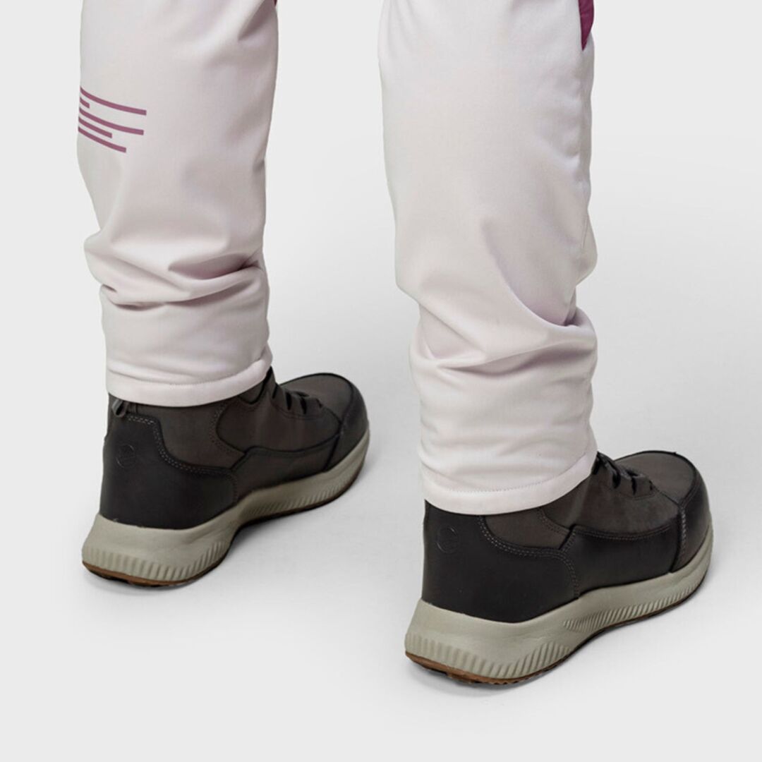 A person in light pants and dark Halti Dundee Mid DrymaxX Winter Shoes stands on a plain white background.