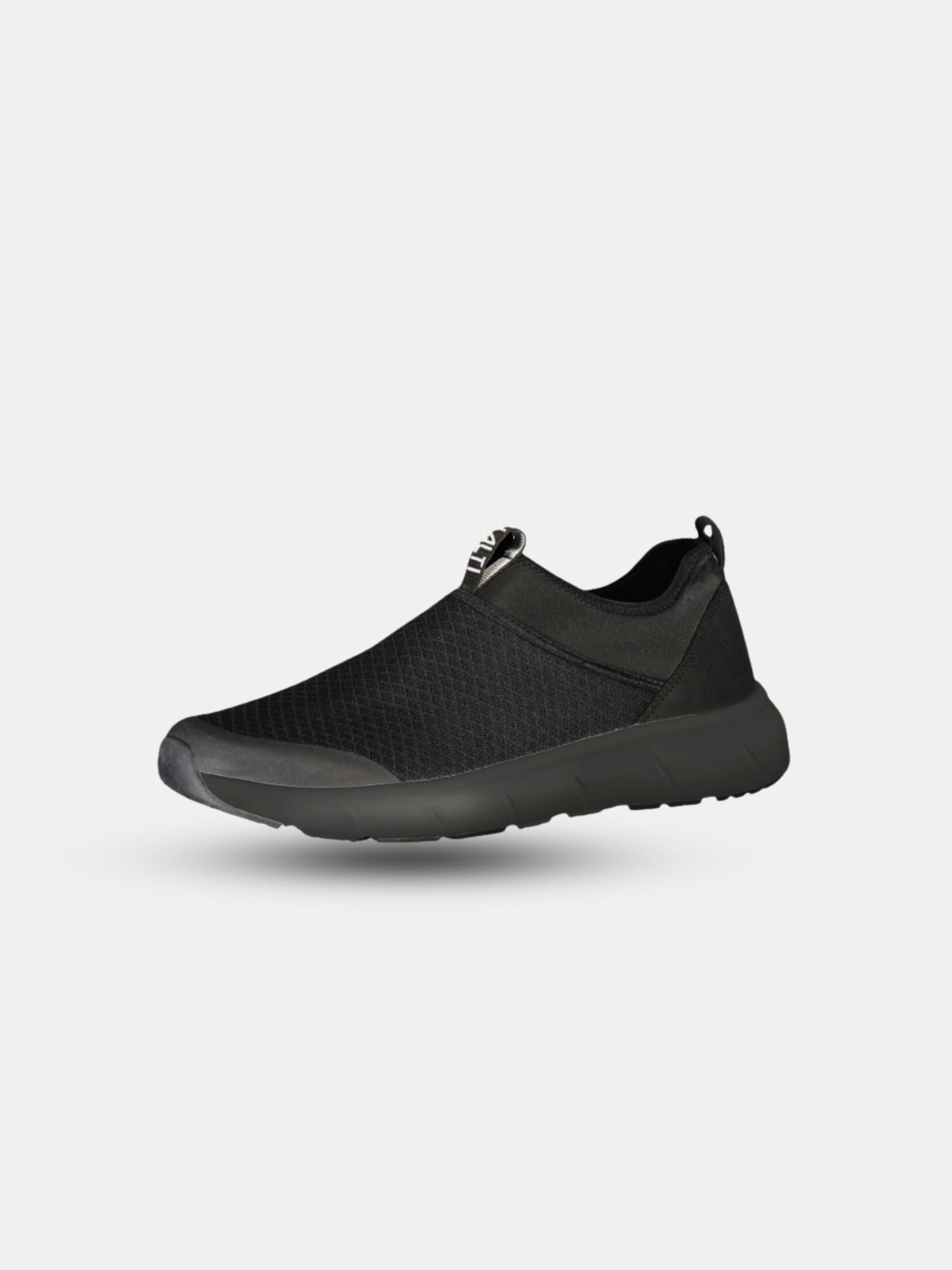 Halti Lester Laceless Sneakers Mens: black slip-on with breathable mesh upper and thick rubber sole.