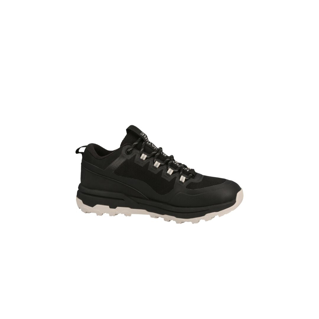 The Halti Hiker Kuru Low DrymaxX Mens shoe is black/white, waterproof, low-top, with a rugged Michelin rubber outsole.