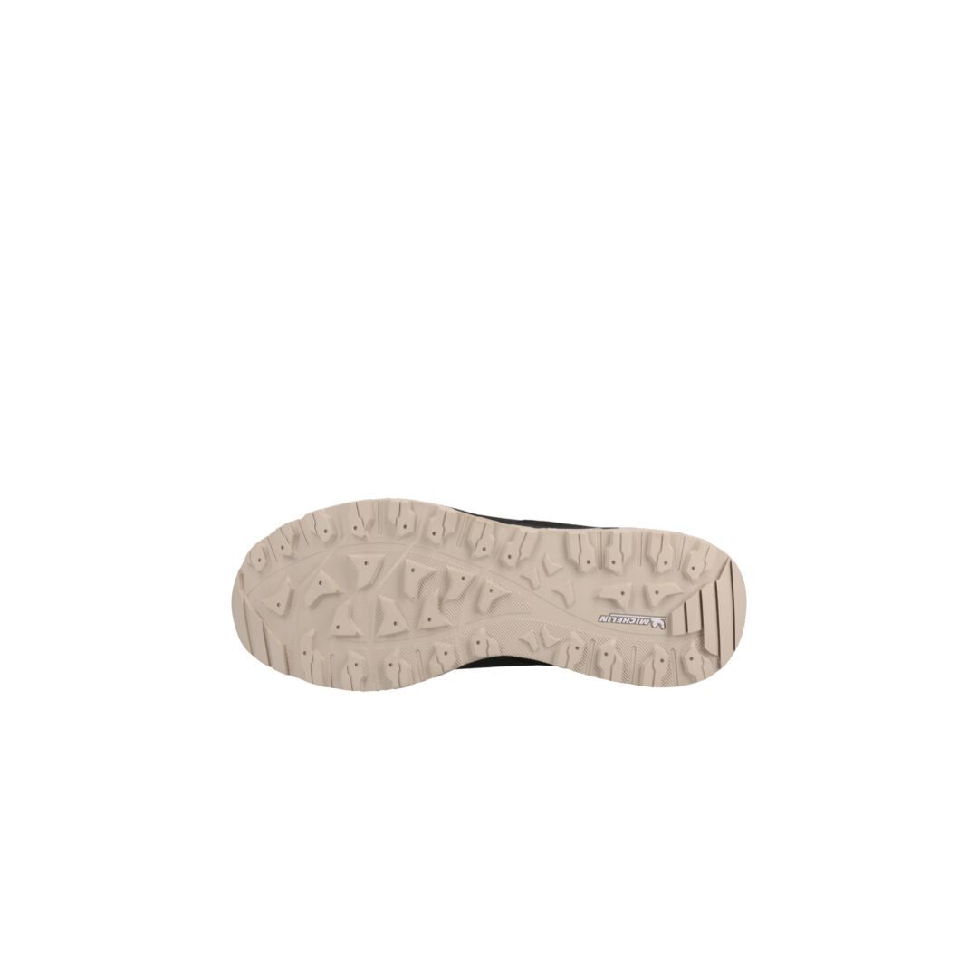Beige textured Michelin rubber outsole of Halti Hiker Kuru Low DrymaxX Mens Shoe, shown against a white background.