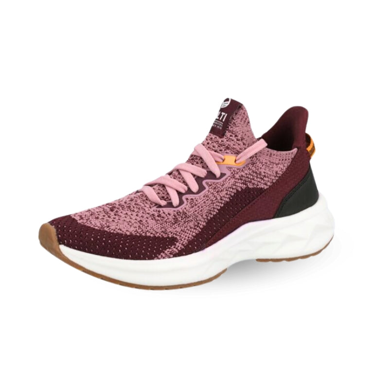 The Halti Sottung Sneaker Womens features a maroon/pink breathable upper, white sole, and recycled polyester.