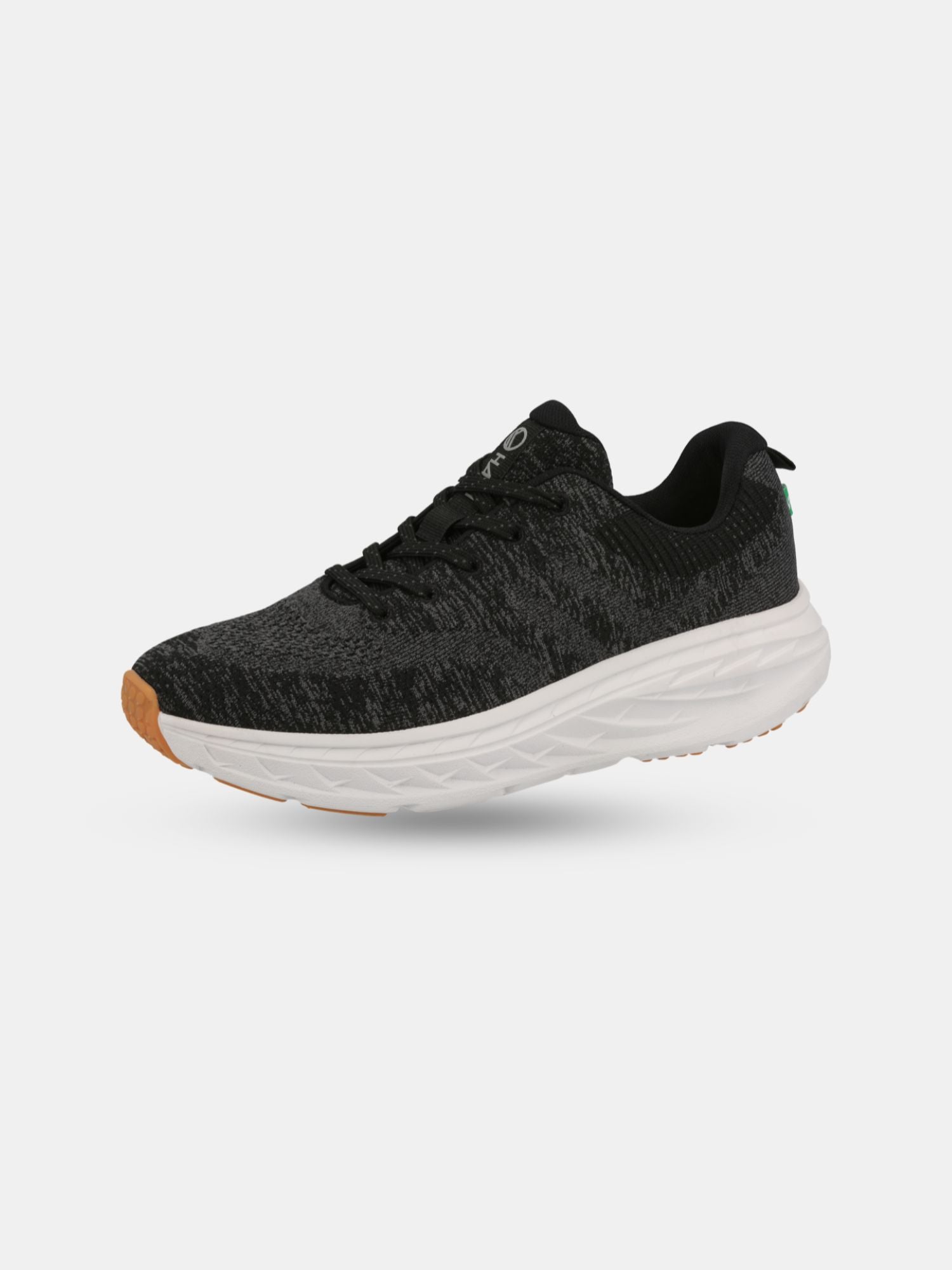 Halti Stem Sneaker Mens in black/gray with a white sole, made from seaweed fiber, shown on a white background.