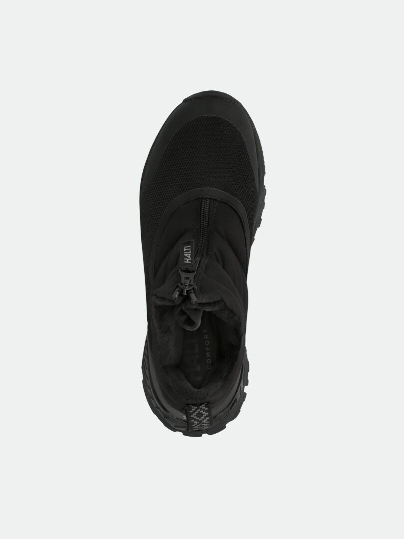 Top view of Halti Toppari Zip DX women’s black waterproof outdoor shoe with front zipper, on a white background.