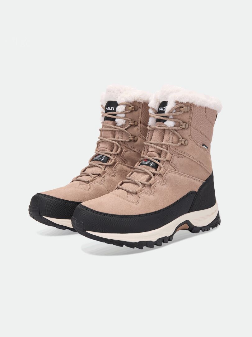 Tan Halti Tornio 2 DX winter boots with faux fur lining, lace-up closures, and a GripmaxX Arctic outsole for traction.