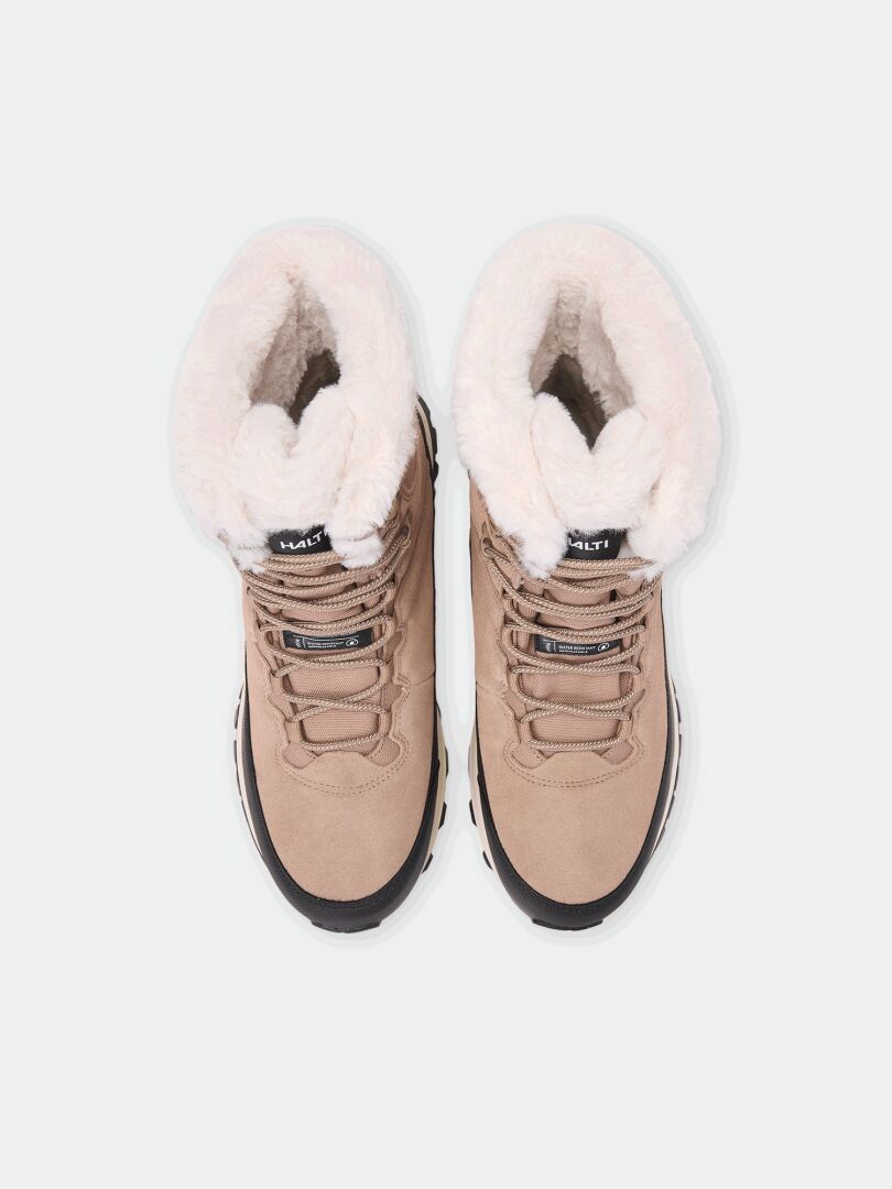 Top-down view of Halti Tornio 2 DX Winterboots: tan lace-up boots with white faux-fur lining and a GripmaxX Arctic outsole.