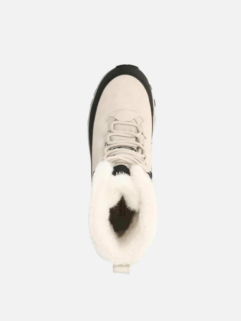 Top view of Halti Tornio 2 DX beige waterproof winter boot with white faux fur, GripmaxX Arctic sole, and beige laces.