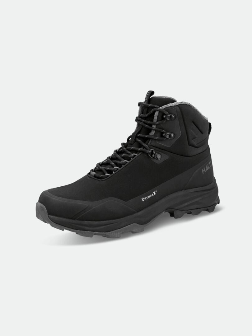 The Halti Kenai Mid 2 DX Spike Shoe Women's is a black, waterproof boot with GripmaxX Spike, ideal for winter walks.