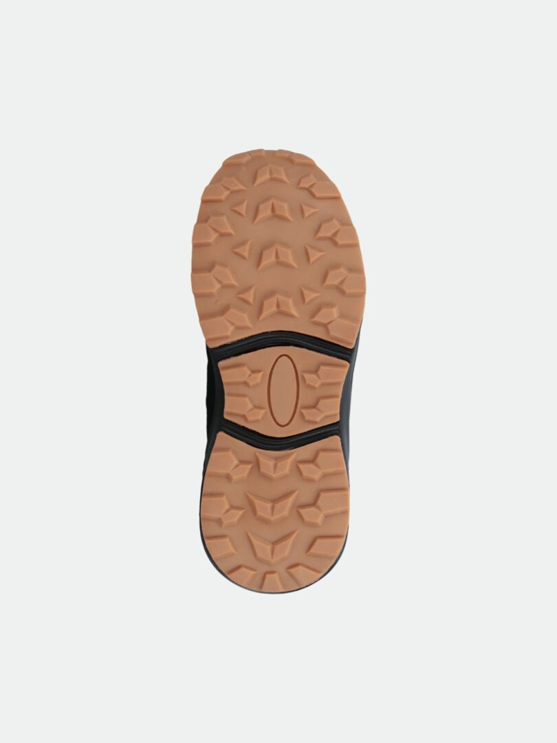 The Halti Rasmus DX Shoe Children's has a tan rubber sole with geometric tread, shown on a plain white background.