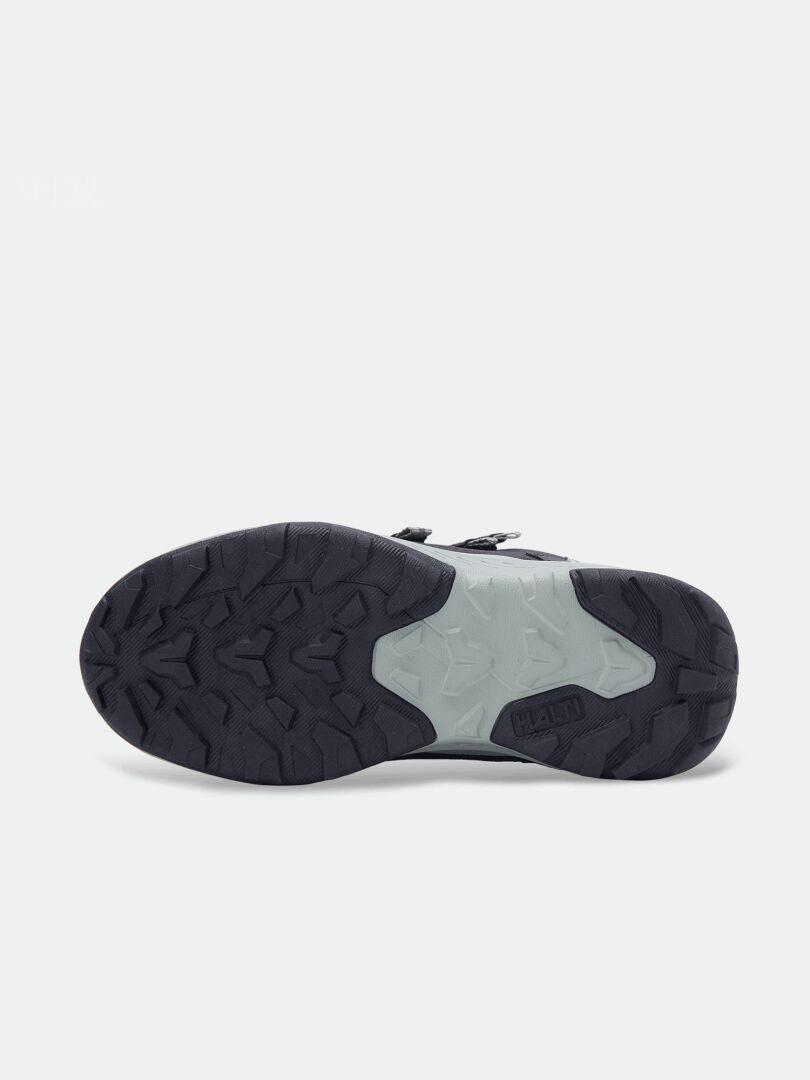 Bottom view of Halti Reiss 3 DX Winter Boot Kids’, showing its rugged, textured sole for traction on plain background.