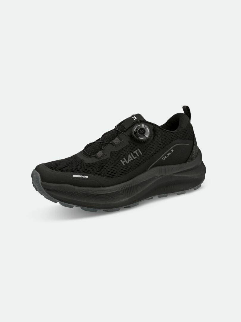 The Halti Rapid DX Freelock Sneaker is a black mesh outdoor shoe with a thick sole and dial closure.