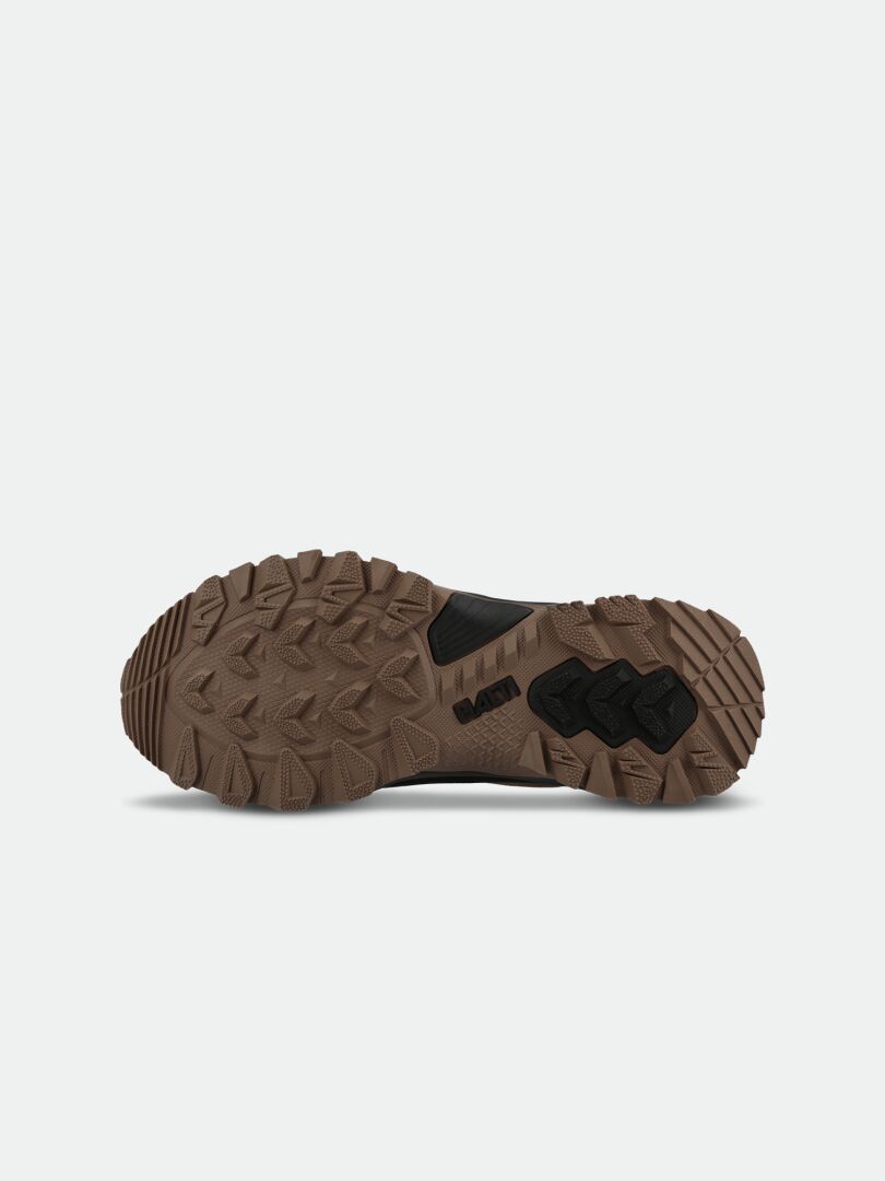 Brown and black GripmaxX Arctic outsole of Halti Nuuksio Mid 2 DX Women's Shoe, shown from below on white background.