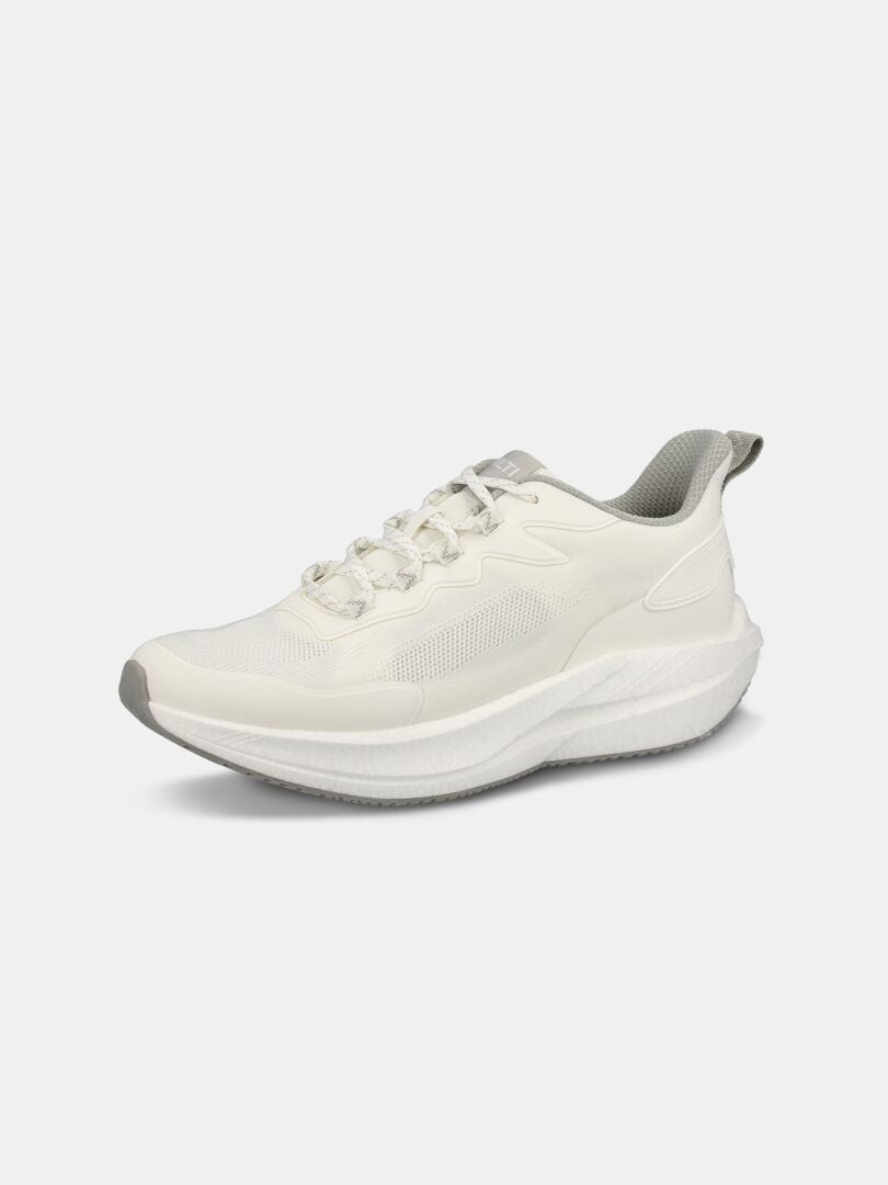 A white Halti Syke Sneaker Men's with gray accents, mesh upper, thick sole, and lace-up closure on a white background.