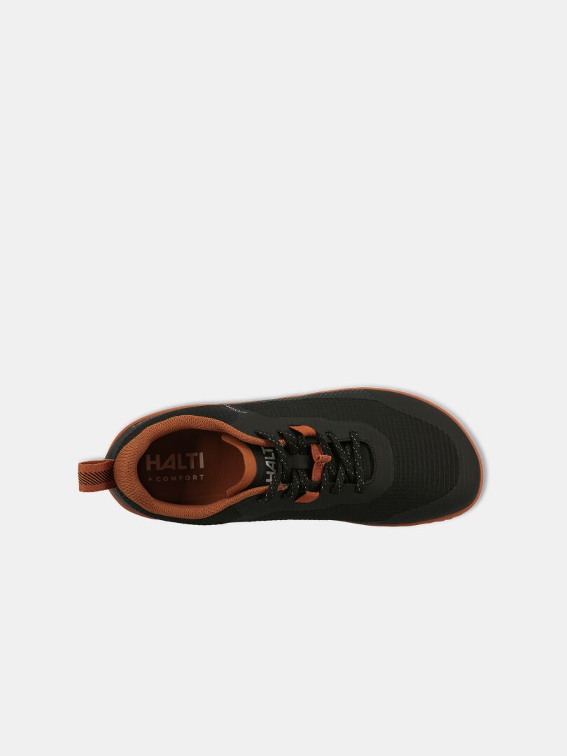 Top view of Halti Tuntuma Barefoot Shoe in black and orange;