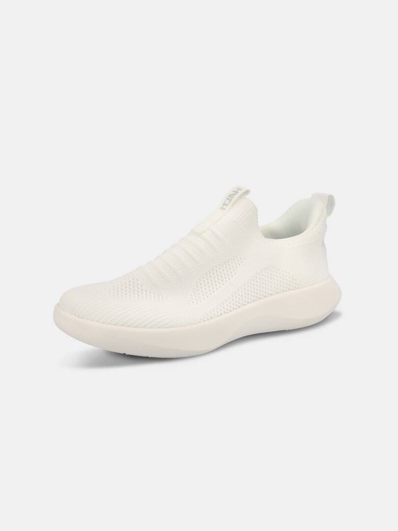 The Halti Snabb 2 StepIn Sneaker Women's is a white, lightweight knit shoe with a thick sole on a white background.