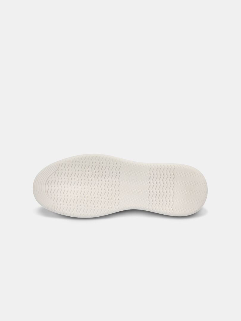 The Halti Lido Canvas Shoe Men's features a lightweight EVA outsole with a wavy, textured pattern for traction.