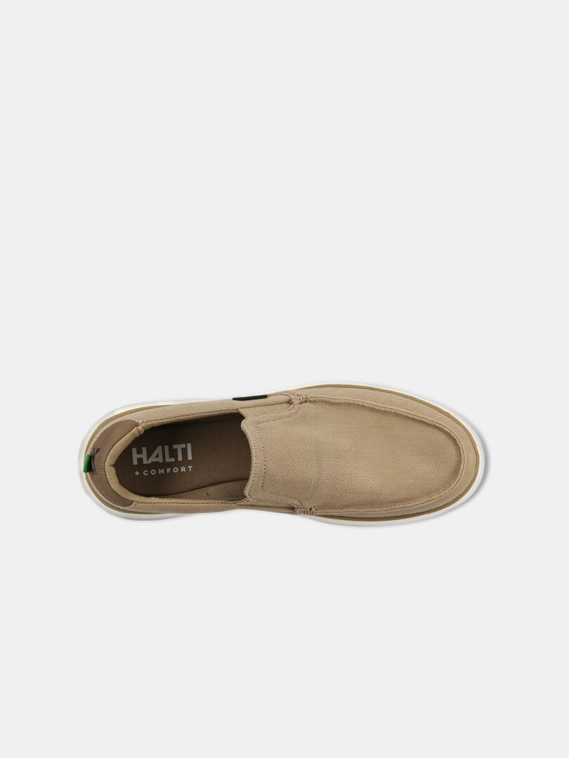 Top view of Halti Lido Canvas Shoe Men's in beige, featuring comfort branding, set on a white background.