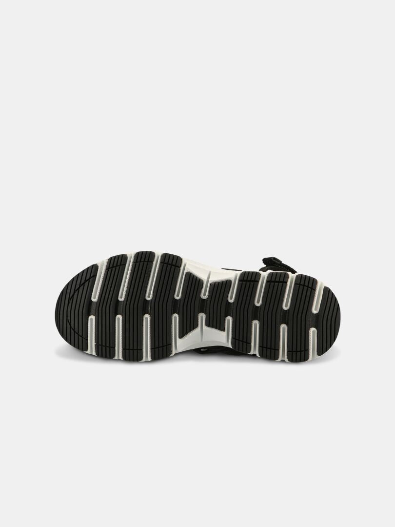 The Halti Resa 3 Sandal Women's sole features horizontal and vertical grooves, shown from the bottom on a plain background.