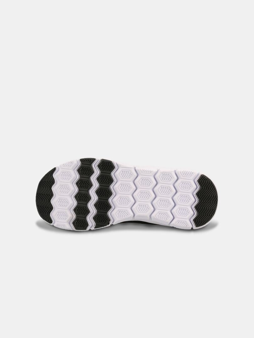 The image shows the white and black hexagonal sole of Halti's Lente 3 Leisure Shoe Children's against a plain background.