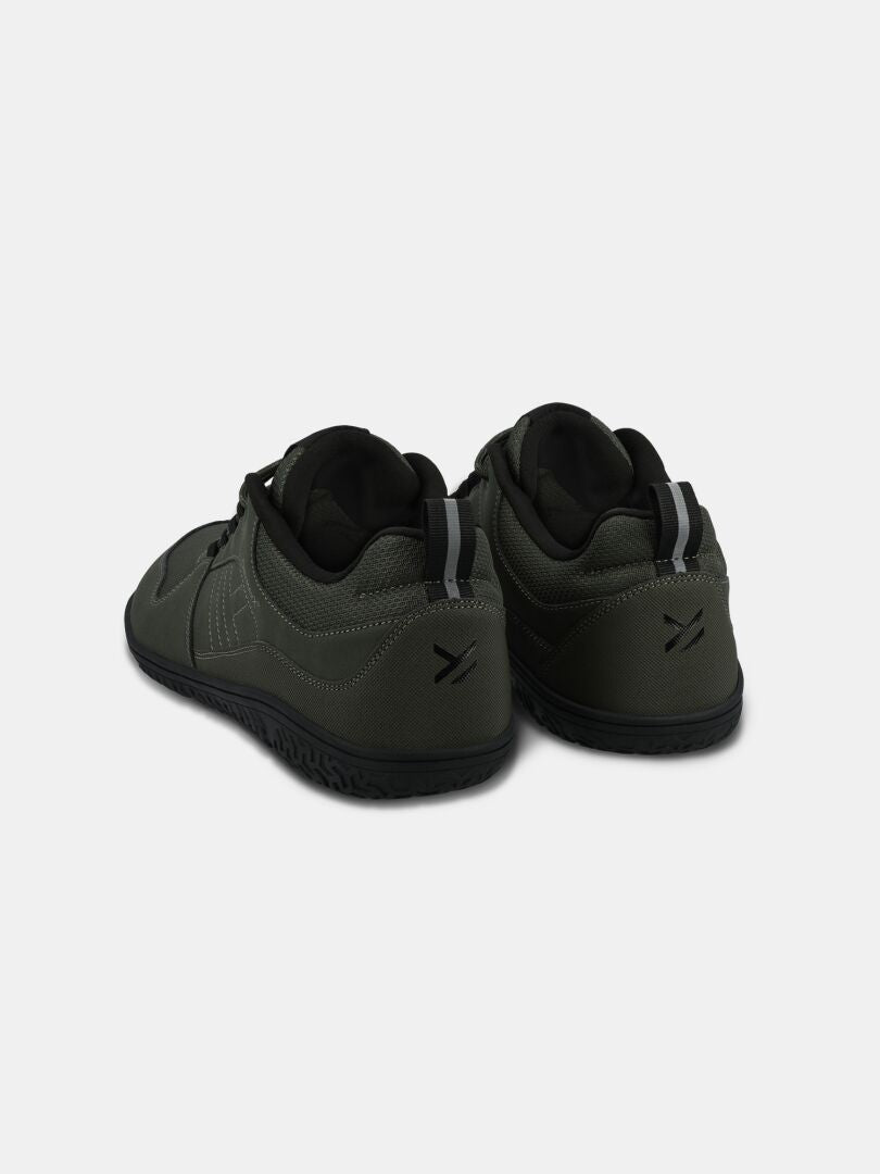 Halti Tuntuma DX Barefoot Shoe Men's in dark green with black soles, shown from the back on a white background.