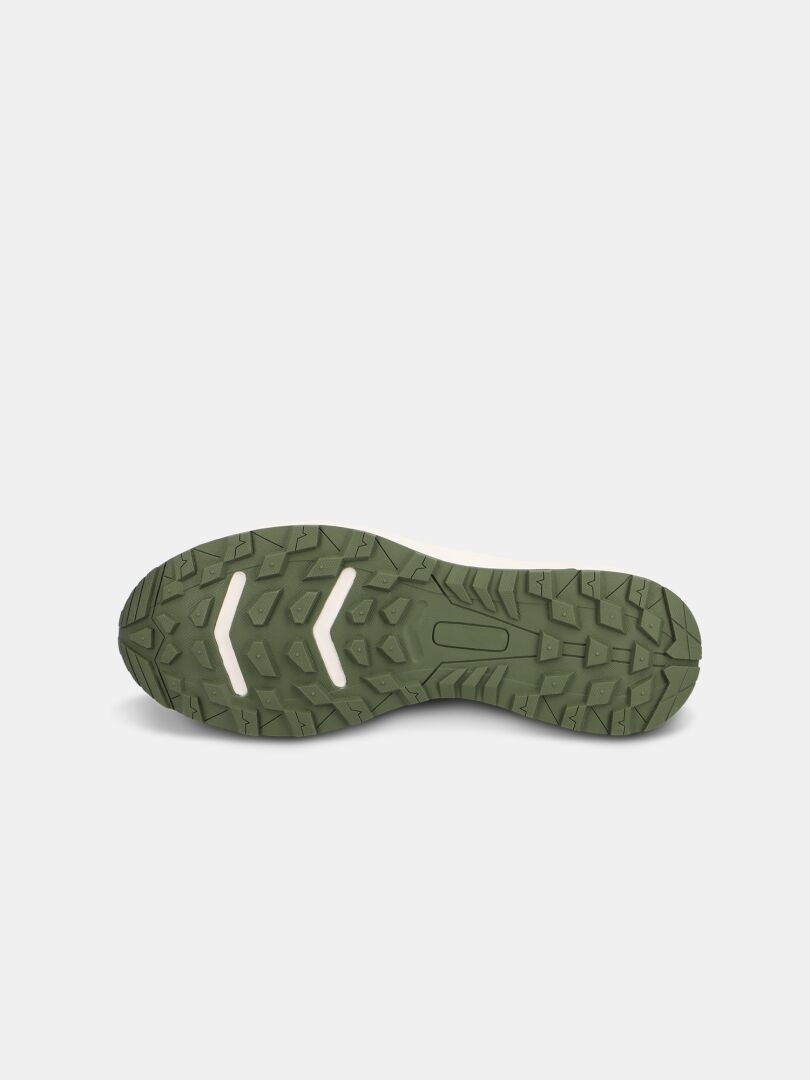 The image shows the green treaded sole of the Halti Seili Hybrid Sandal Men's with a rugged, textured pattern facing upward.