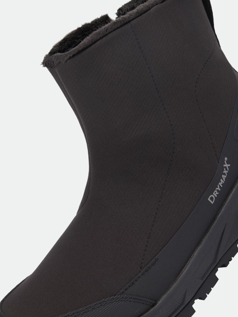 Black Kajuk Mid DX IC winter boot with a faux-fur lining and a Michelin Ice Grip outsole.