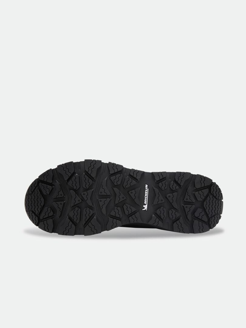 Black Kajuk Mid DX IC winter boot with a waterproof DrymaxX membrane and a thick, treaded Michelin Ice Grip outsole.