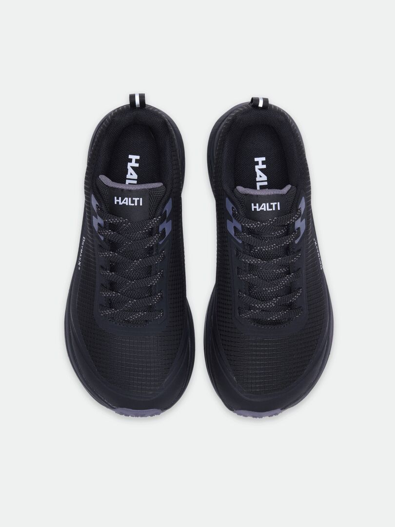 A pair of Halti Asento DX women’s outdoor shoes, black with laces and zero-drop heel, seen from above.