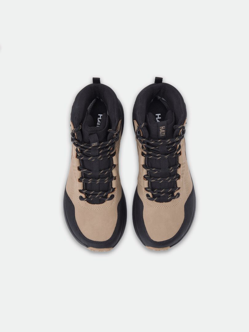 Halti Asento Mid DX men’s beige and black waterproof outdoor shoes with black laces, top view on white.