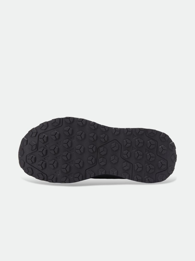 Black Halti Rest Winter Boots Women’s outsole with a textured, multi-directional lug pattern.