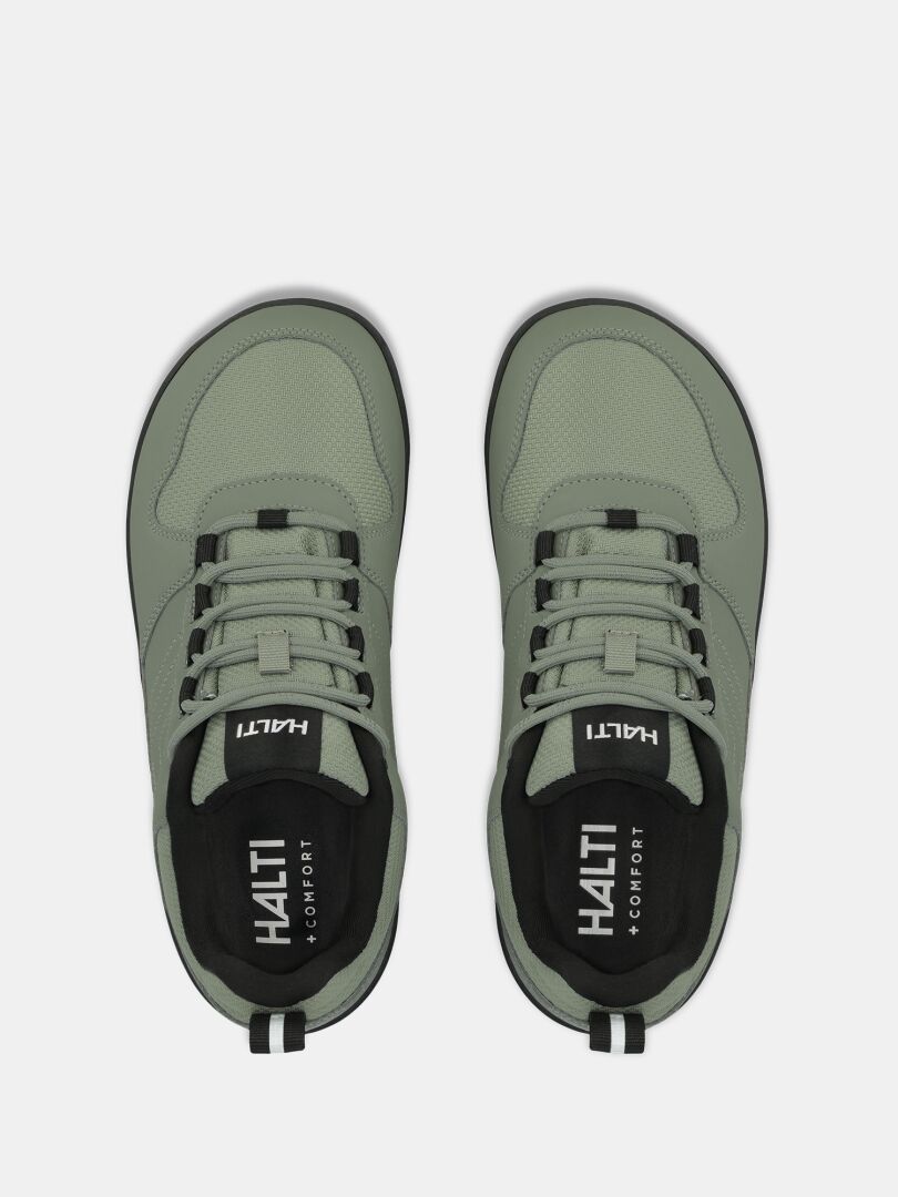 A pair of green Tuntuma DX Barefoot Shoes by Halti, lace-up style, seen from above on a white background.