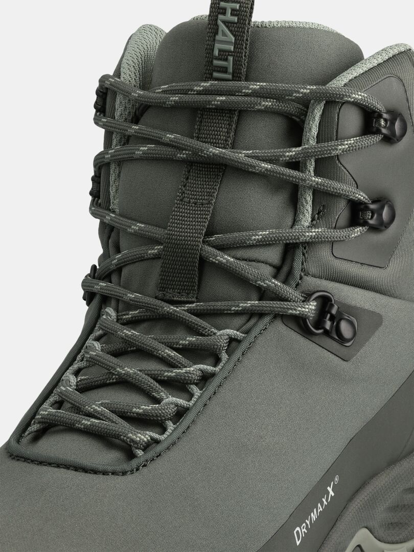 Close-up of Halti Fara Mid 4 DX men’s gray outdoor shoe with laces, DRYMAXX logo, and metal eyelets for trail use.