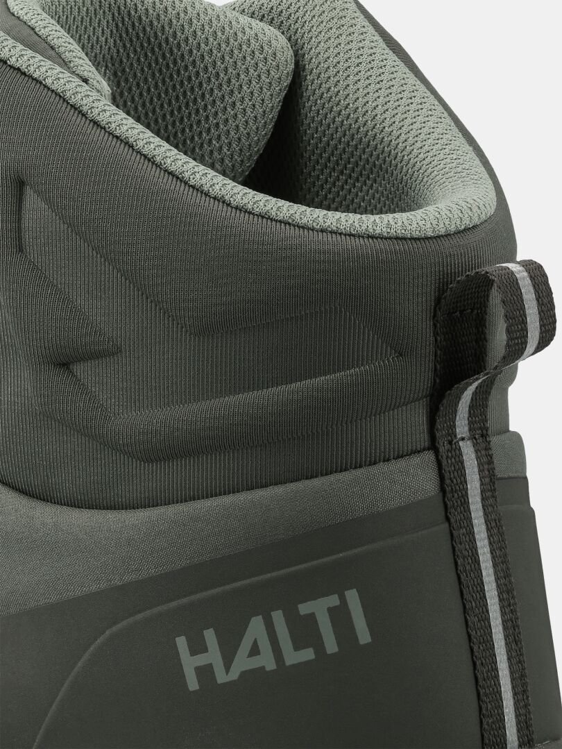 Close-up of Halti Fara Mid 4 DX men’s shoe in green with padded collar and reflective loop.
