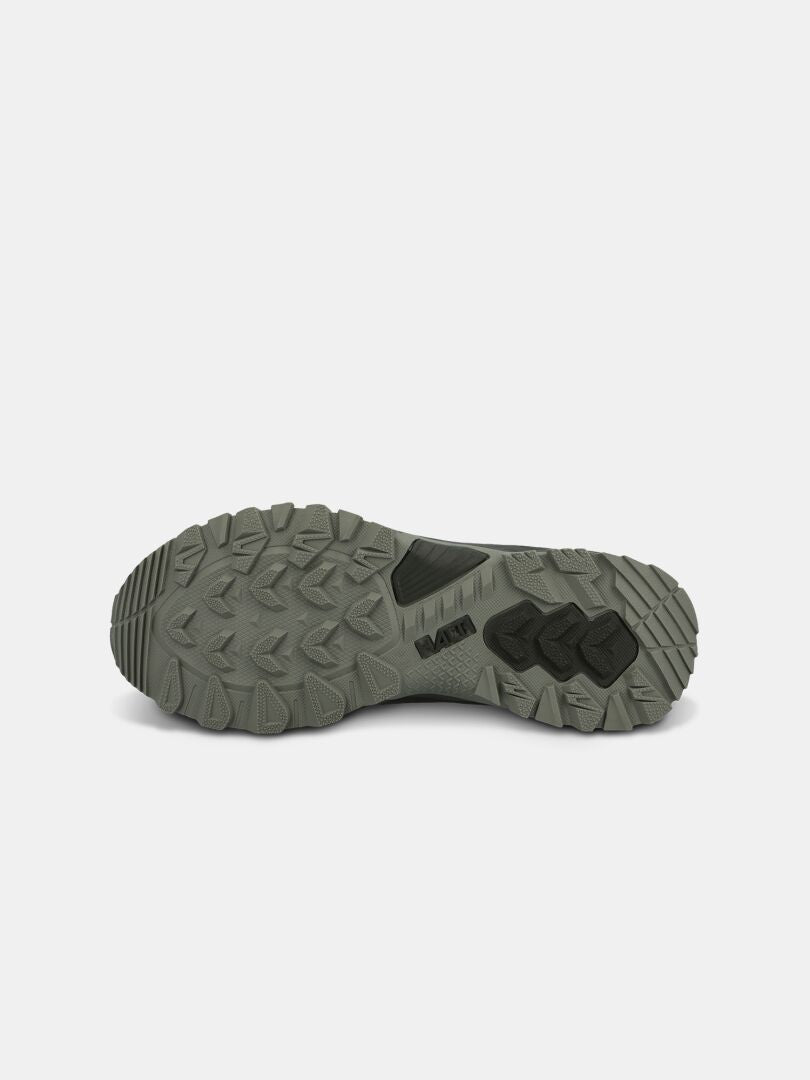 Halti Fara Mid 4 DX Men’s shoe: gray rugged sole for trail traction, mid-cut style, shown on white background.