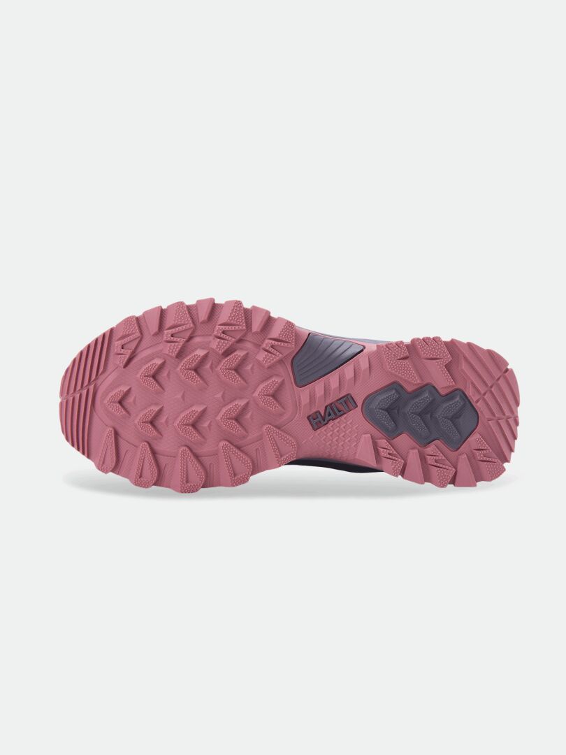 Halti Fara Mid 4 DX for women has a white GripmaxX Trail outsole with pink tread, black accents, and strong traction.