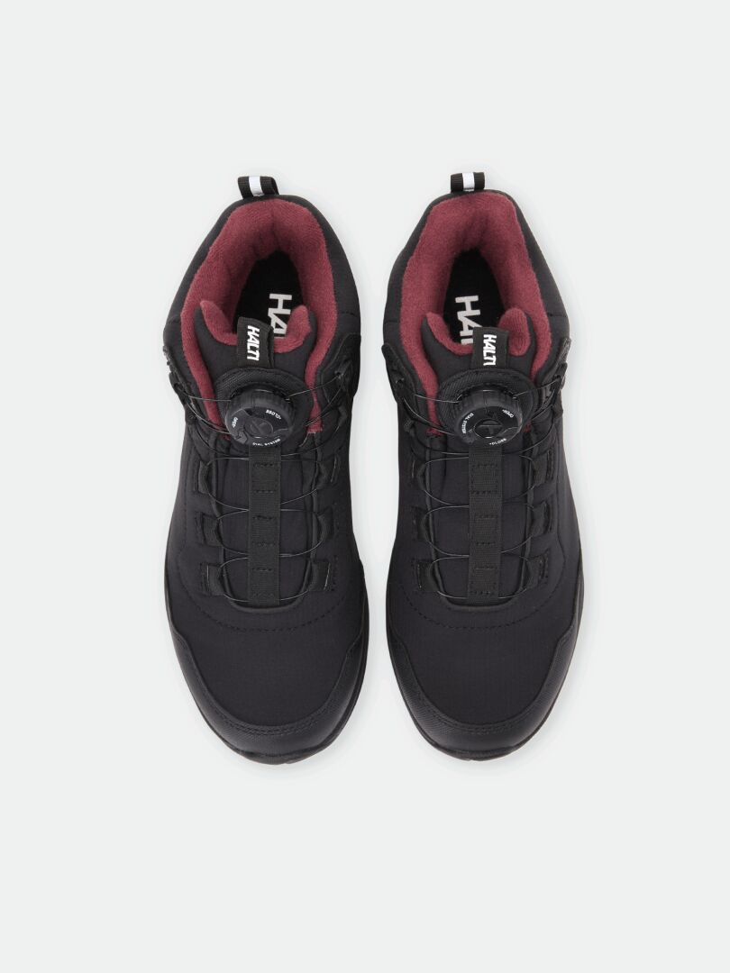 Black mid-top waterproof Halti Lynx Mid DX Freelock Spike Shoe Women’s with a dial lacing system and dark red lining.