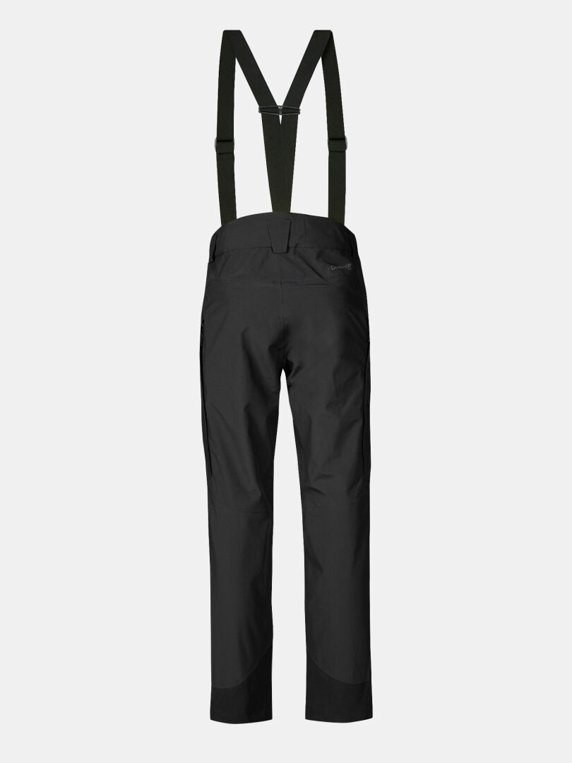 Halti Settler 3L DX Men's black waterproof ski pants with adjustable suspenders, shown from the back on white.