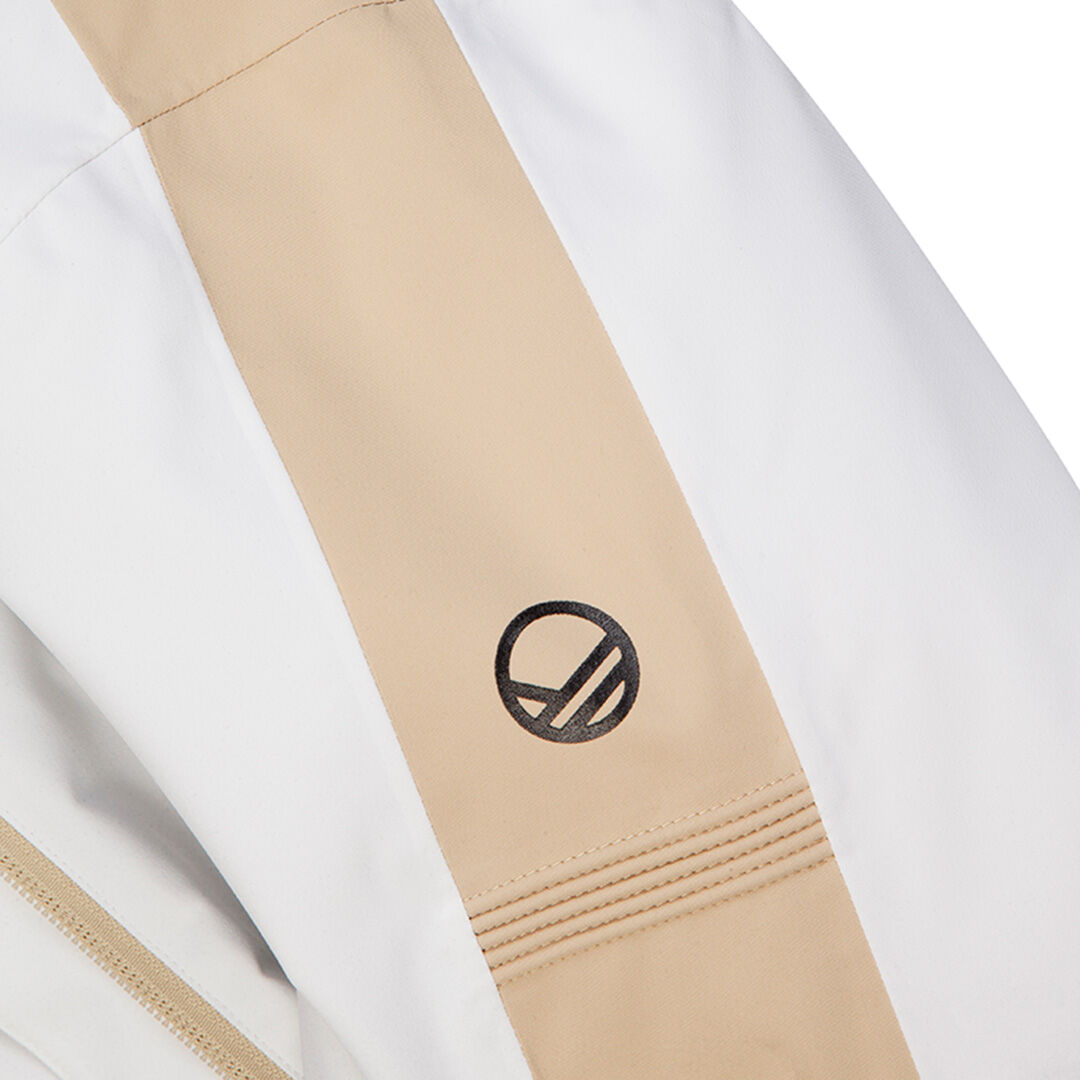 Halti Radius DX Women's Ski Jacket in white and beige with a black circular logo and visible stitching details.