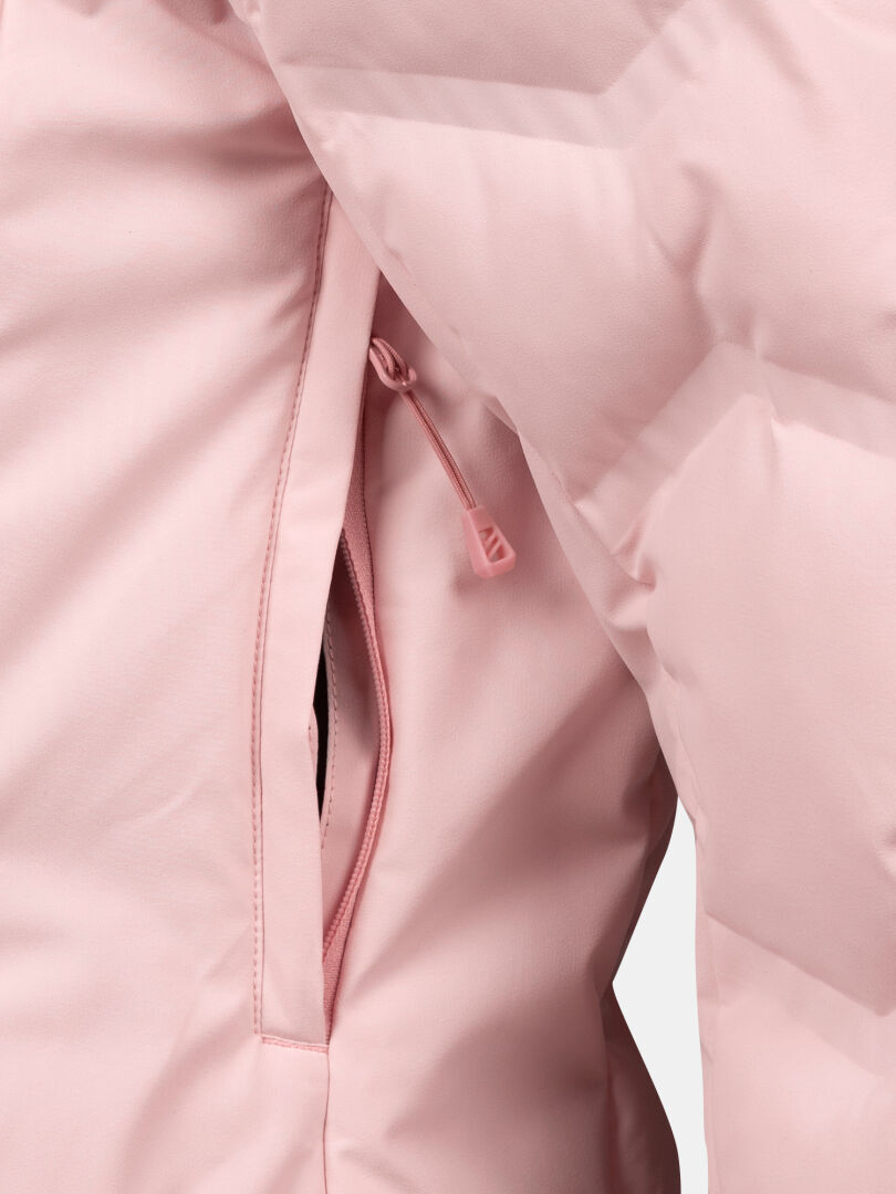 Close-up of the Halti Nordic Arcty II women’s ski jacket in light pink, showing a zippered side pocket.
