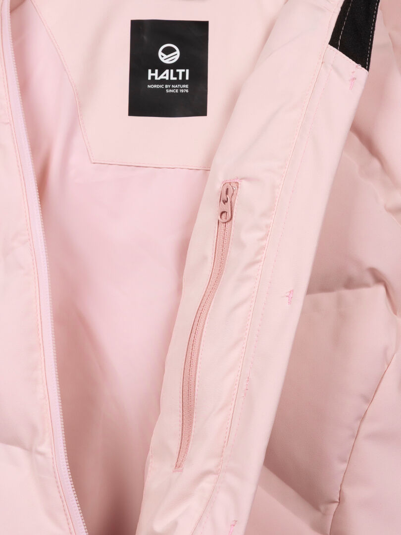 Close-up of the Nordic Arcty II Ski Jacket Women’s interior, showing a zippered pocket and a black Halti label.