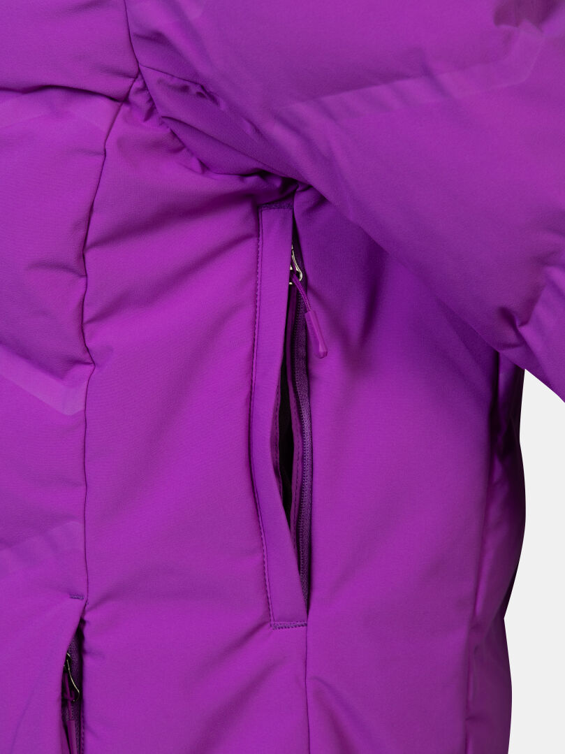 Close-up of Halti Nordic Arcty II Ski Jacket Women’s in purple, showing a partially open zippered side pocket.