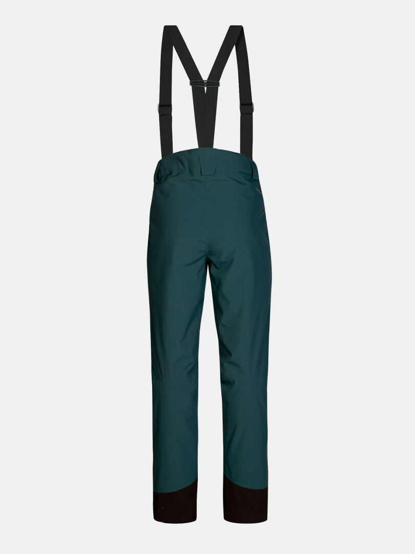 Back view of Halti Carvey II DX Ski Pants Women’s in dark teal with black suspenders.