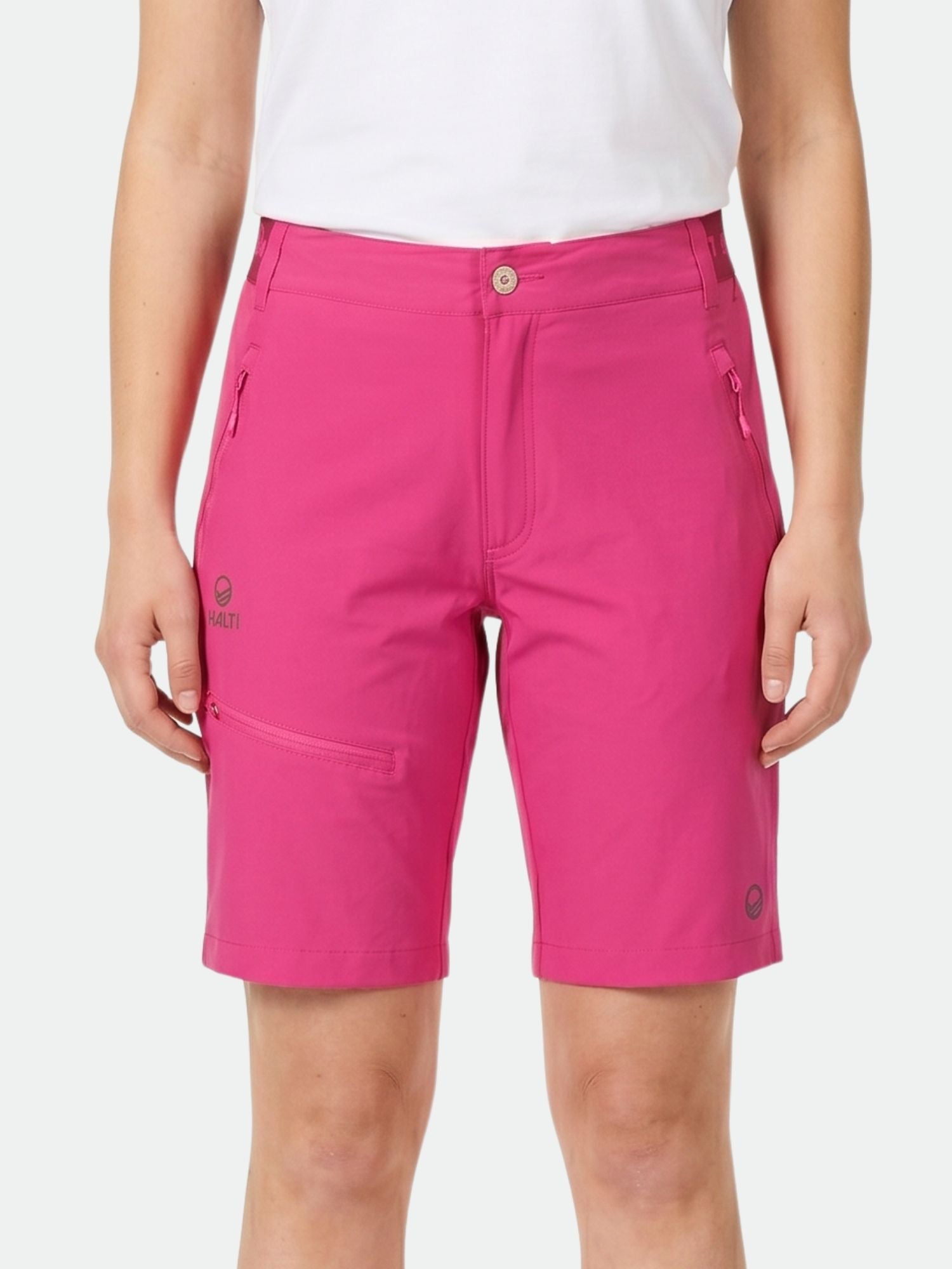 Model in white shirt and Halti Pallas Women's X-stretch Lite Shorts, bright pink, against a plain white background.