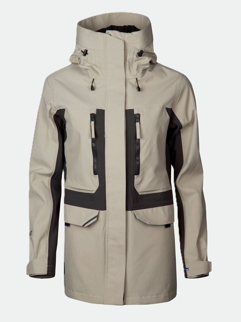 Halti Hiker Womens DrymaxX Parka Jacket in beige/black, hooded, waterproof, with zip pockets shown on plain background.