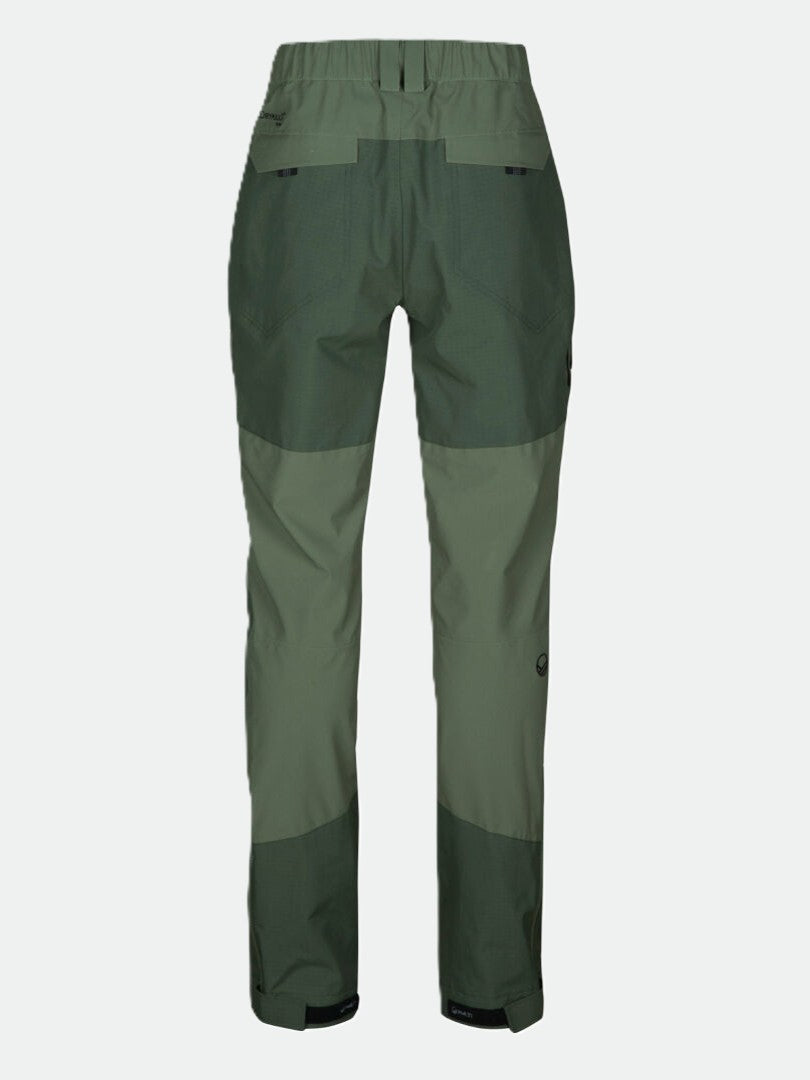 Rear view of green Halti Hiker 3L DX Ventilated Pants for women with elastic waist, back pockets, and reinforced knees.