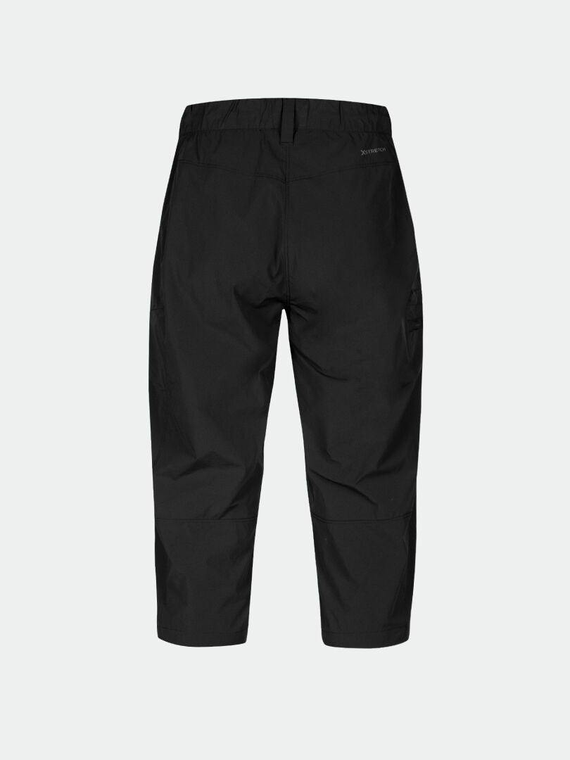 Halti Pallas Cool X-stretch Womens Capri Pants, black with elastic waist and reinforced knees, shown from the back.
