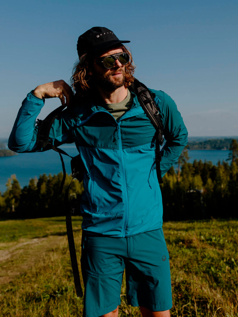 Lightweight men’s outdoor jacket and shorts from Halti’s Pallas Cool collection – designed for summer adventures with UPF 90+ sun protection fabric.