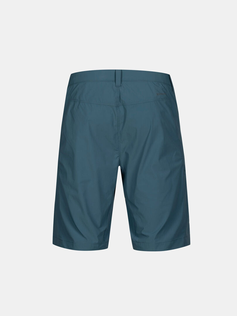 Back view of Halti Pallas Cool X-stretch Men’s teal shorts with belt loops and moisture-wicking fabric.