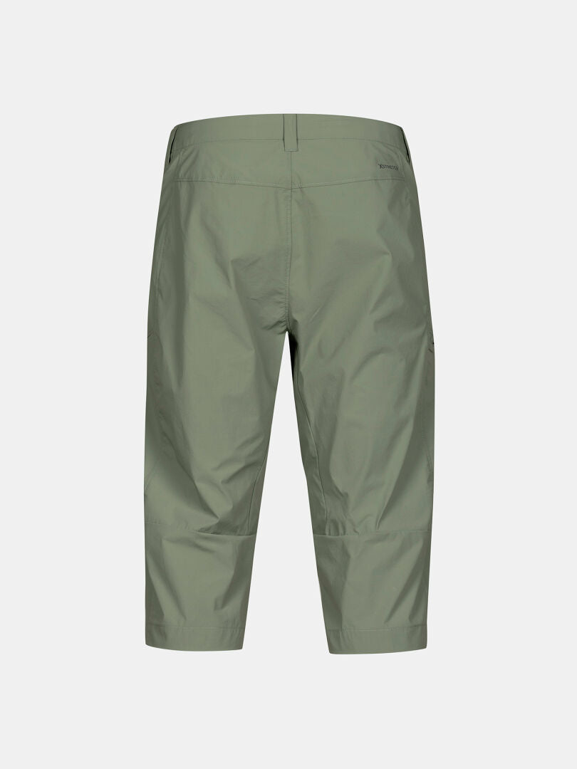 Back view of Halti Pallas Cool X-stretch men’s capri pants, light green with belt loops and moisture-wicking fabric.