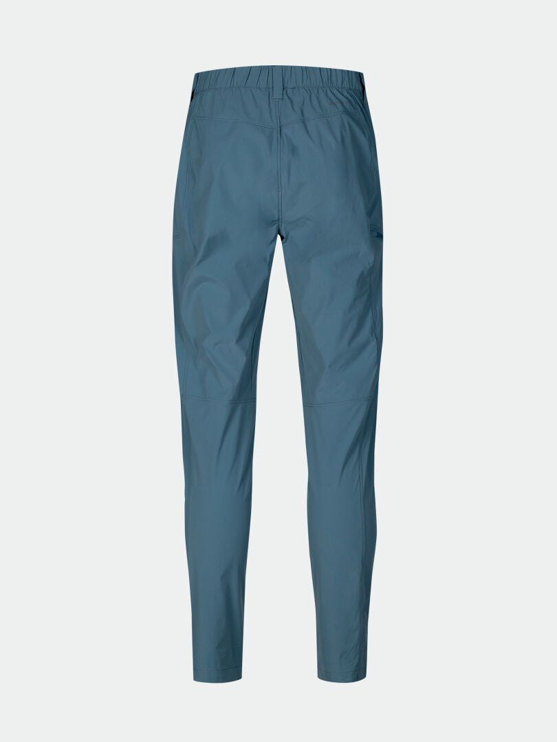 Back view of Halti Pallas Cool X-stretch Pants Mens in blue with elastic waistband, moisture-wicking fabric, plain background.